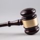 A gavel on a white background.